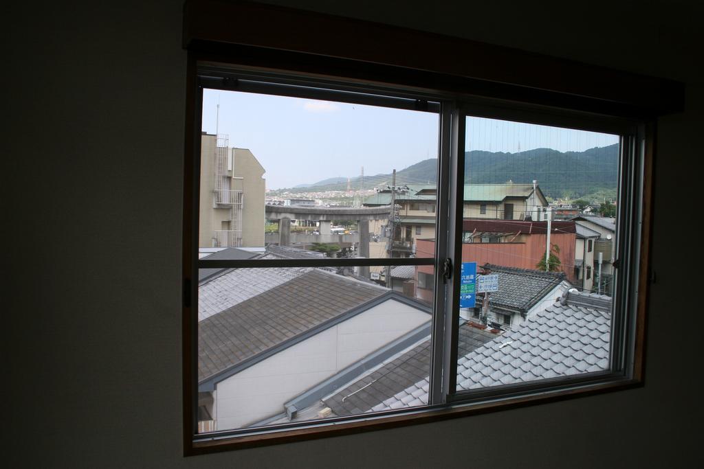 Travellersdou Kirinya Hostel Uji Exterior photo